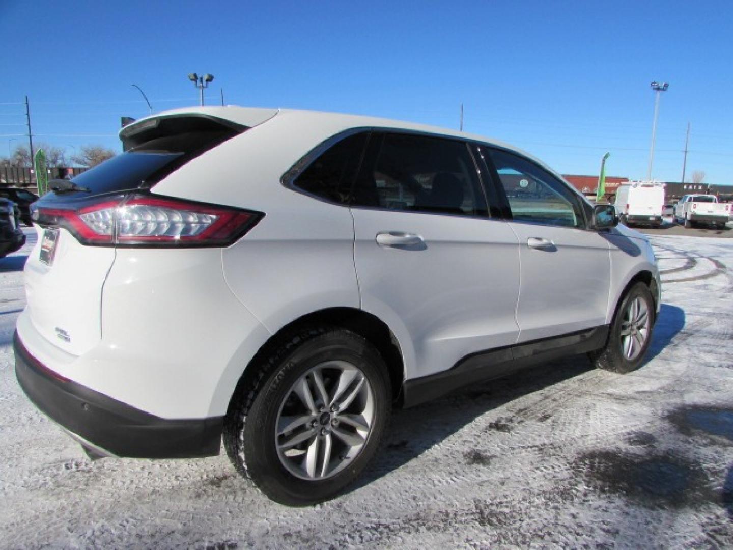 2018 White /Gray Ford Edge SEL (2FMPK4J9XJB) with an 2.0 I4 Ecoboost turbo engine engine, Automatic transmission transmission, located at 4562 State Avenue, Billings, MT, 59101, (406) 896-9833, 45.769516, -108.526772 - 2018 Ford Edge SEL AWD - Low miles - 27 mpg on the highway! 2.0 I4 Ecoboost Engine - automatic transmission - all wheel drive - 71,044 miles SEL package - air conditioning - tilt wheel and telescoping steering wheel - cruise control - bluetooth audio with Microsoft SYNC to pair your devices - - Photo#4